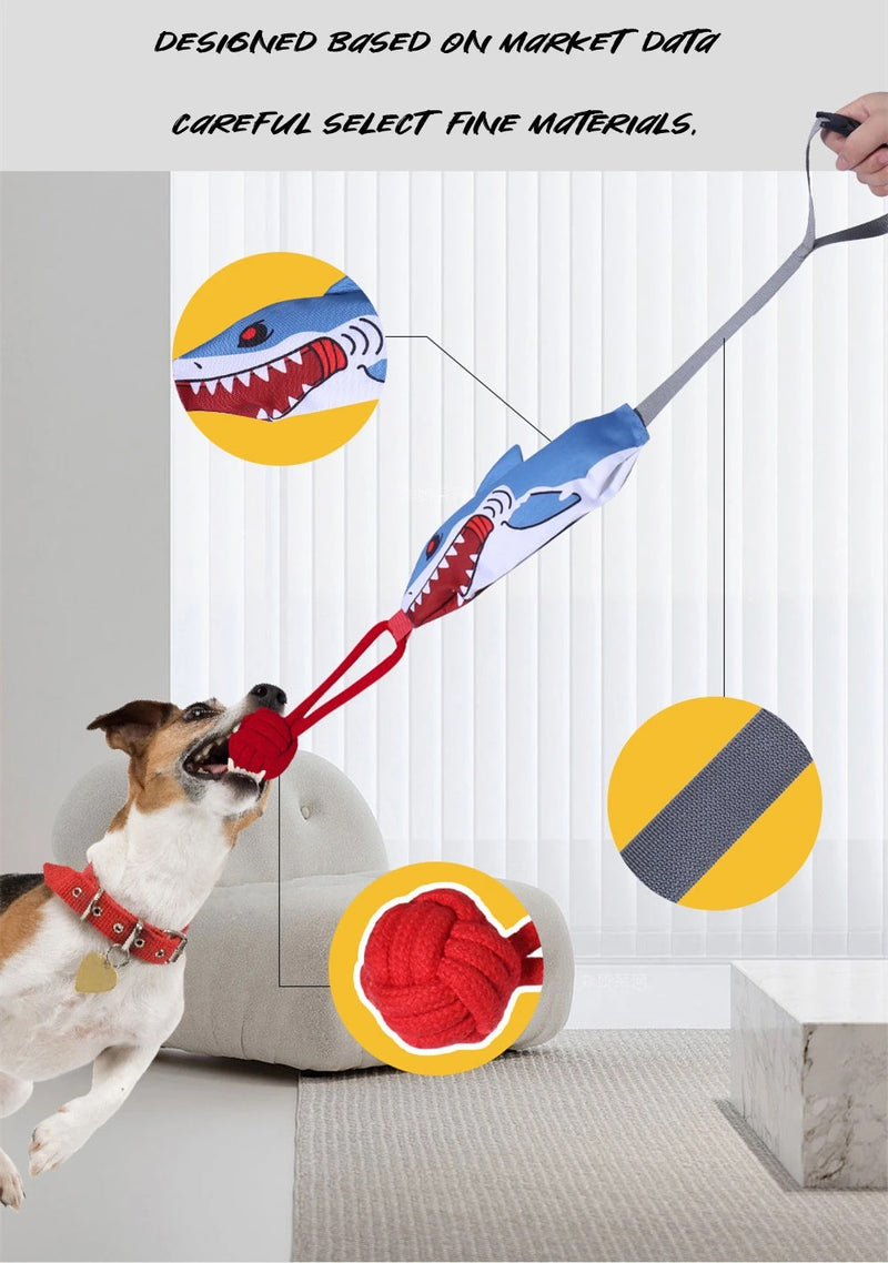 dog biting squeaky tug of war toy